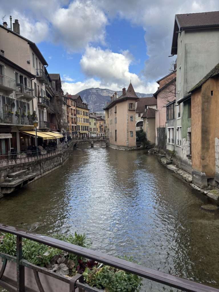 annecy village - the beautiful town below the mountains 