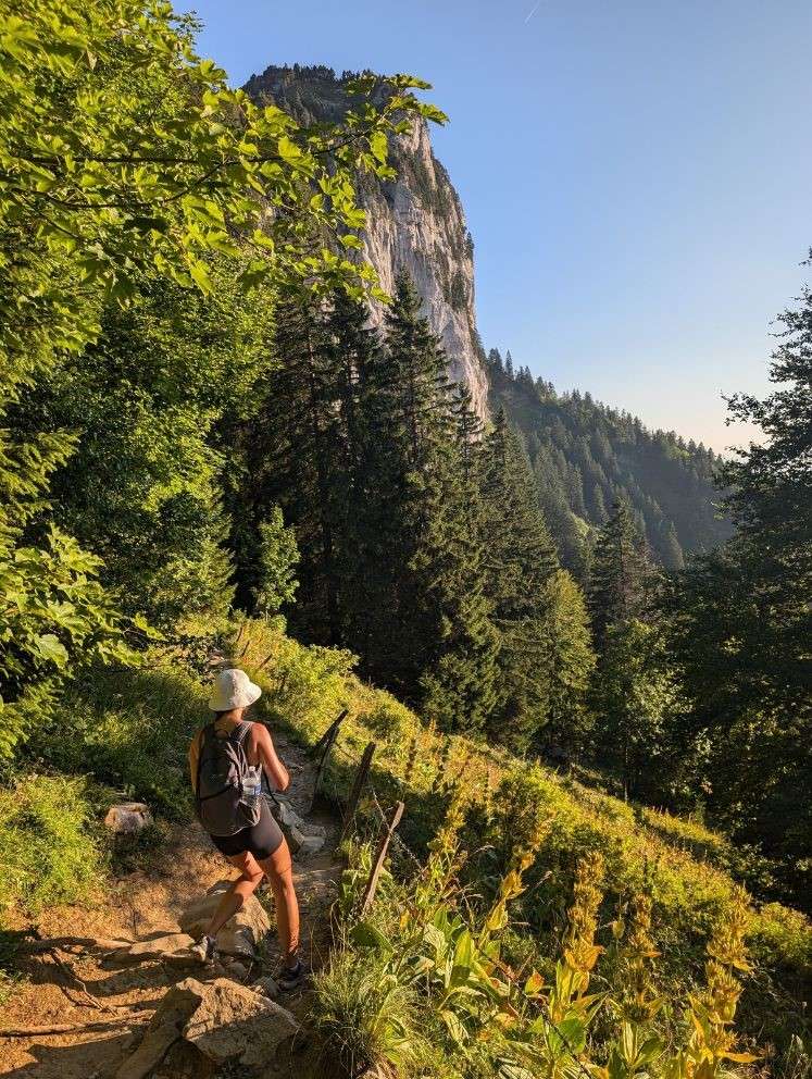 Hiker enjoying one of the best hikes near Annecy with alpine views