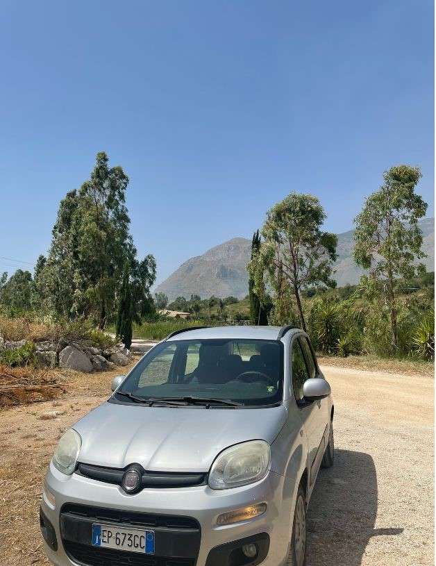 Rental car parked and ready for a road trip at a travel destination
