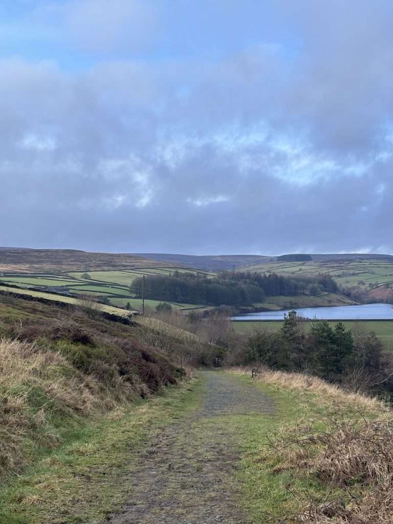 views of the yorkshire moors in haworth and view of the lowe laithe reservoir 
